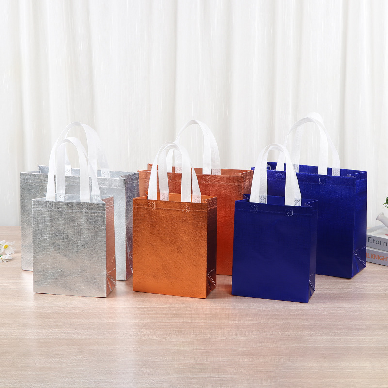 Bolso de tela no tejida chapado en oro y plata en papel de aluminio, bolso de tela no tejida empaquetado en bebidas, bolso de compras de regalo con logotipo impreso