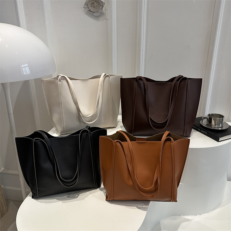 Europa y los Estados Unidos de la generalidad Retro Capacidad Casual Mujeres 2026 nueva moda simple simple de hombro bolsa