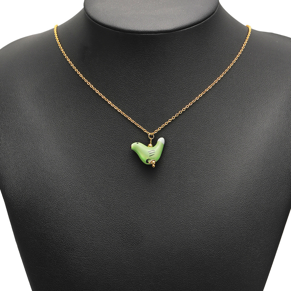 Colgante de cerámica pintado y colgante de mariposa paloma de la paz DIY collar versátil joyas de pulsera al por mayor