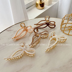 ドービーのアクセサリーの大きいサイズの蝶結びの合金のヘアピンの気質はサメの魚を巻いて後頭部の髪の気質のクリップの女性を挟みます。