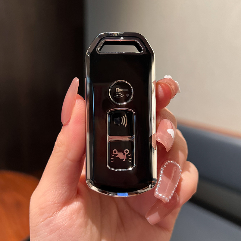 Imágenes aplicables Fosha 350 funda de llave de motocicleta agrietada 125 Xindazhou ns125la/PCX150 funda de hebilla