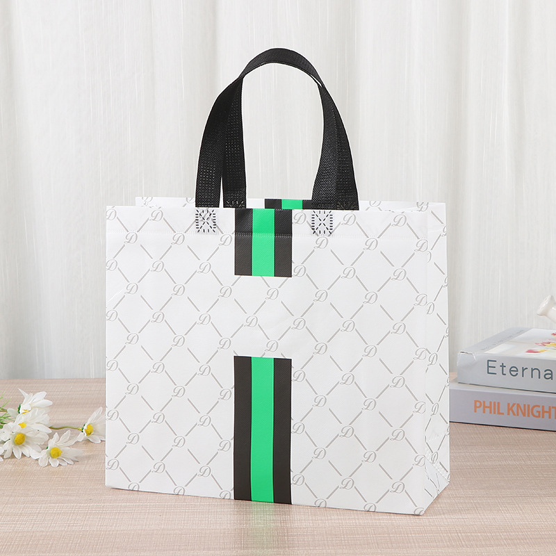 Bolsas de tela no tejida de película en caliente en la exposición publicitaria de gran capacidad bolsas de mano en blanco bolsas de compras de regalo