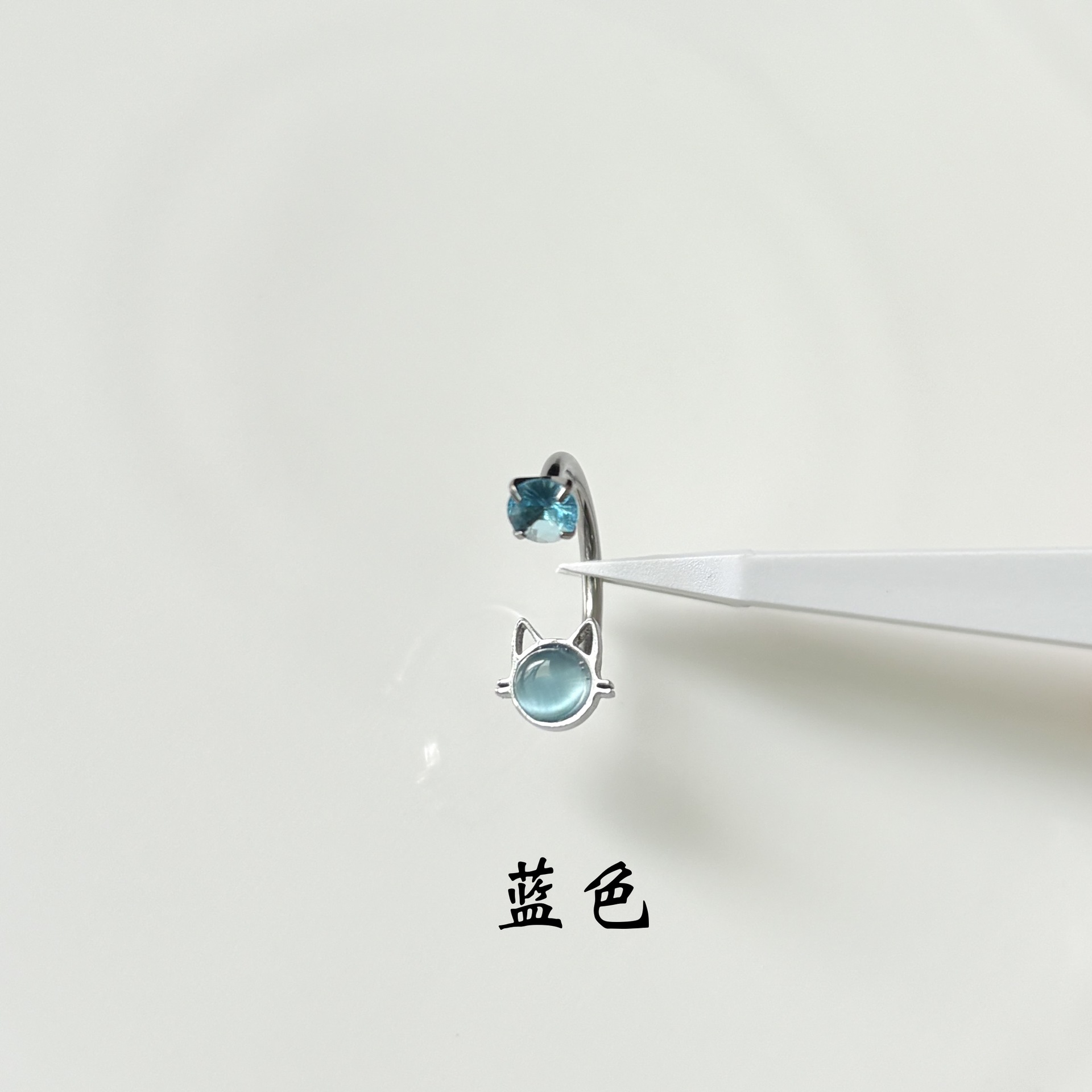 Silver pointed spike labret stud material detail