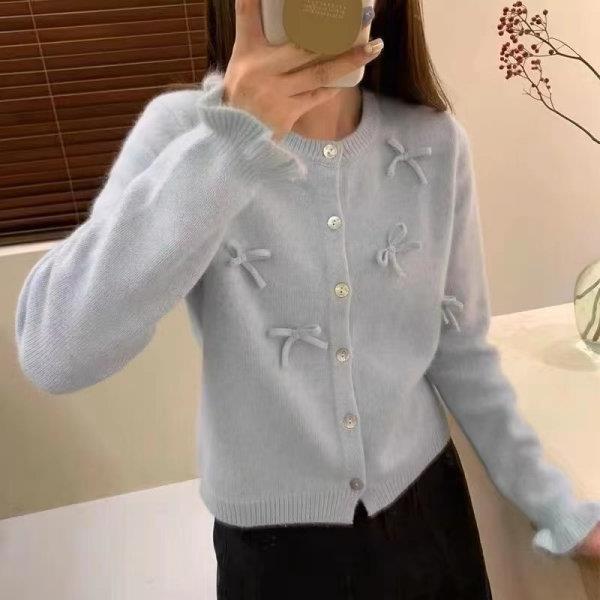 蝶結びの洋風の韓国版のニットのカーディガンのセーターの春と秋の新型の女性の上着の外は大衆のデザイン感の丸首を着ます。|undefined