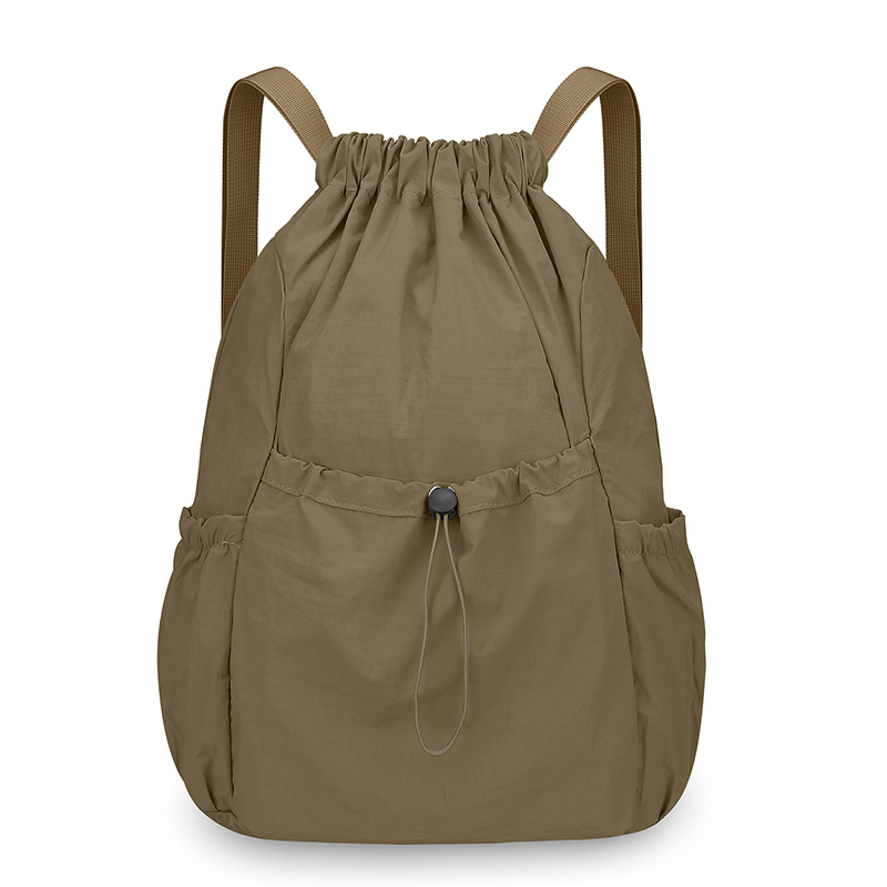 Mochila de cuerda ligera comercio exterior mochila al aire libre coreana de gran capacidad de mujeres viajes viajeros ociosos bolsa al por mayor