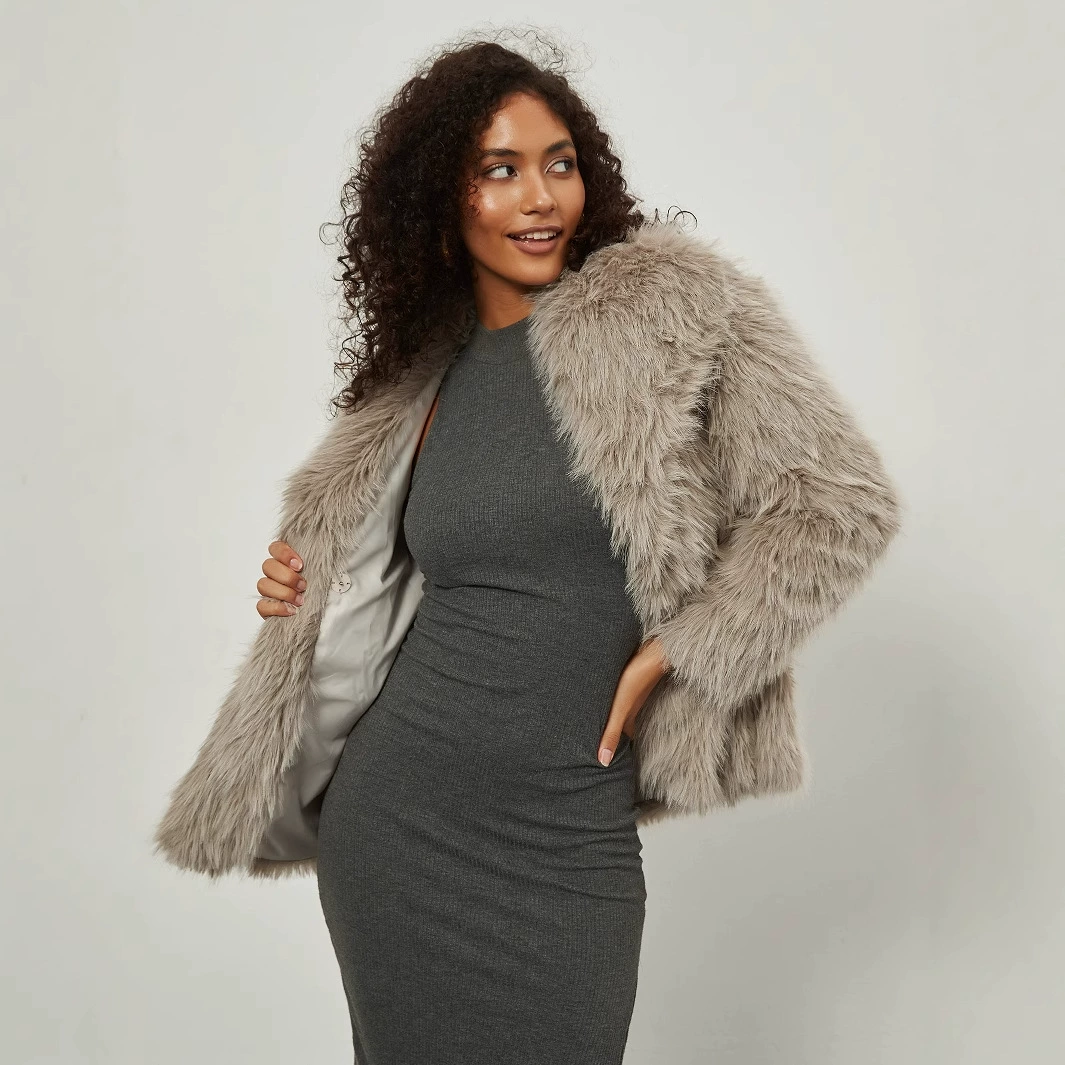 Трансграничная женская одежда оптом европейский и американский стиль моды искусственный мех теплая куртка 2024 новый зимний стиль отворот пальто