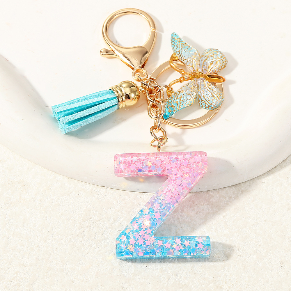 Europa y los Estados Unidos transfronterizos nuevos cristal sequinado goteo de goma letras inglesas joyería llavero y bolsos colgante apoyo al por mayor