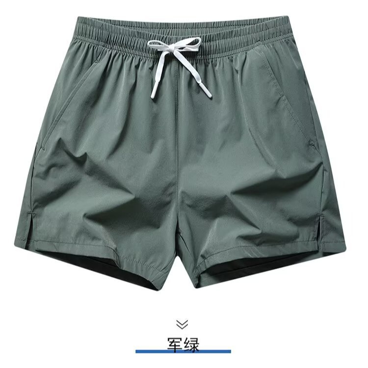 Casual de secado rápido, pantalones cortos de tres puntos de color sólido, pantalones cortos rectos elásticos sueltos, pantalones casuales de seda de hielo para hombre, pantalones de playa para hombre