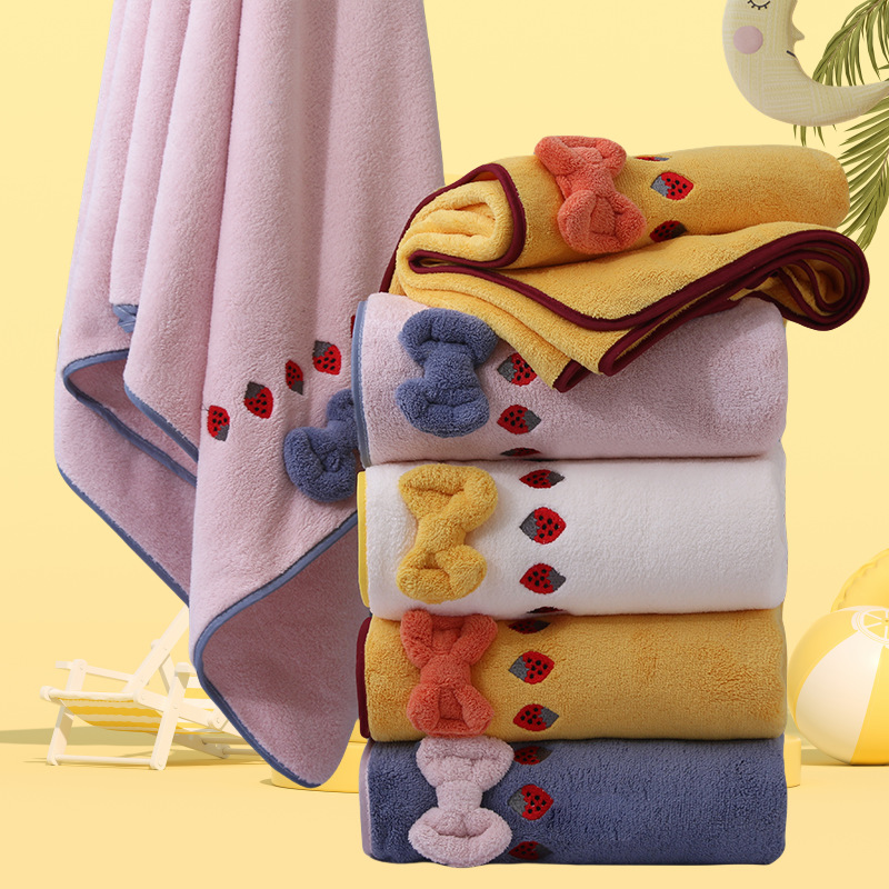 coral bath towel with bow