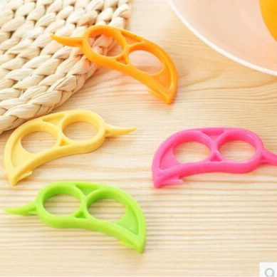 Fruit peeler mouse‑shaped handheld citrus peeler, dual‑blade plastic, compact orange