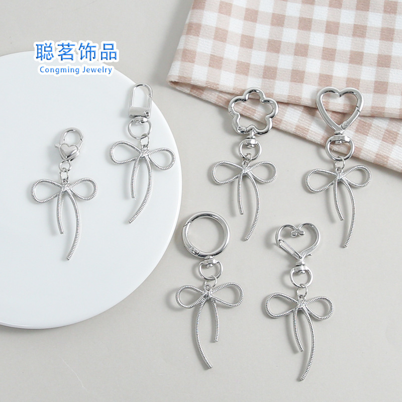 Creative Zinc Alloy Sweet and Cool Cut Out Bow Key Pendant Simple and Versatile School Bag DIY Pendant Accessories Wholesale