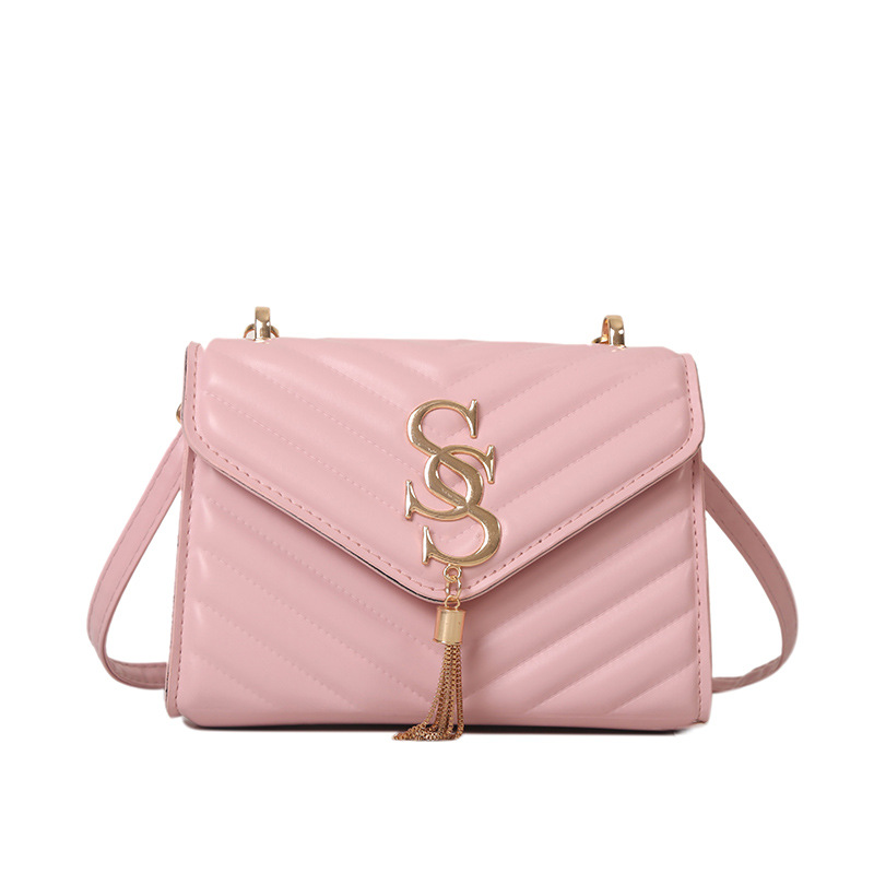 Bolso simple de moda personalizada para las mujeres 2023 otoño nueva moda metal borla bolsa de hombro cadena mensajero bolsa para mujeres