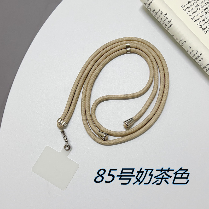 携帯ケースにナイロンのストラップが貼られています。|undefined