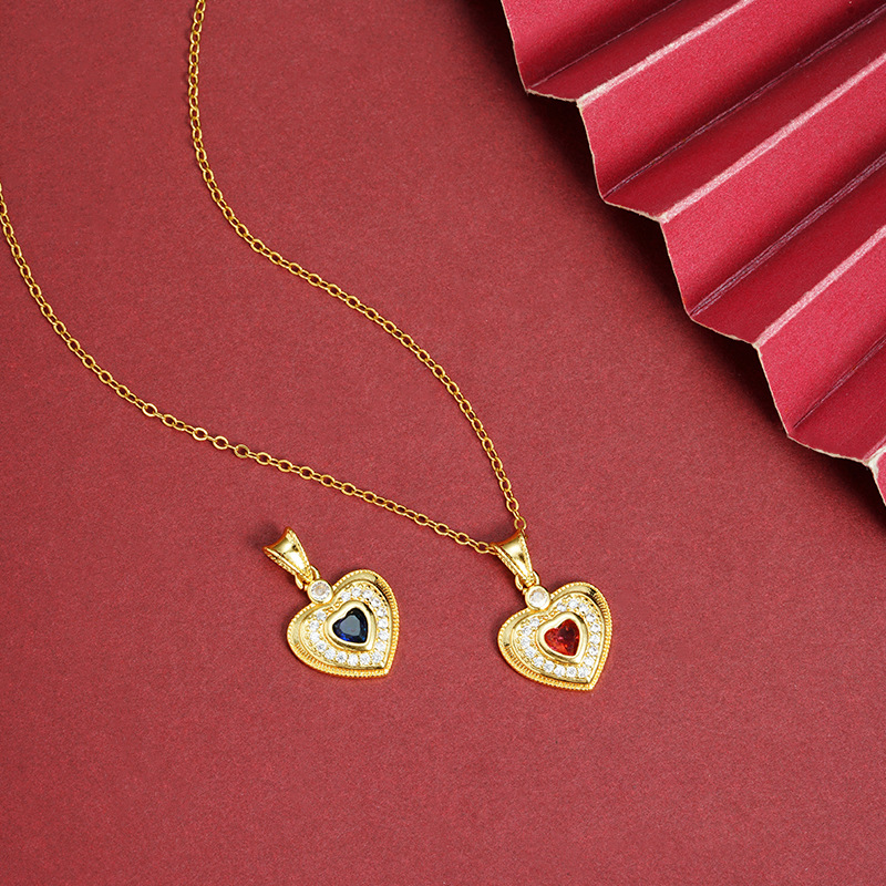 Colgante de oro de arena de Vietnam, viento de lujo ligero, diamantes, zafiro rojo, colgante de amor, diseño de nicho para niños, sentido de joyería al por mayor