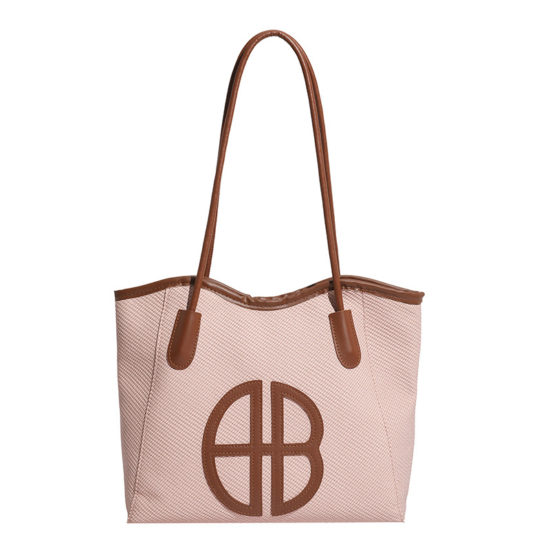 Bolsa de brazo de gran capacidad para viajar 2026 nueva moda bolso de mujer de alto nivel nicho bolso de hombro bolso especial para mujeres