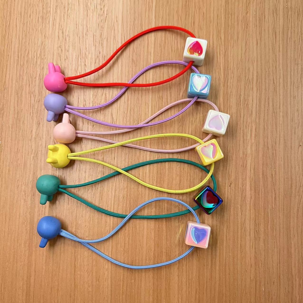 Yiwu venta al por mayor cuerda de pelo de doble cabeza para niños cuerda de pelo negro Yiwu agente de compra