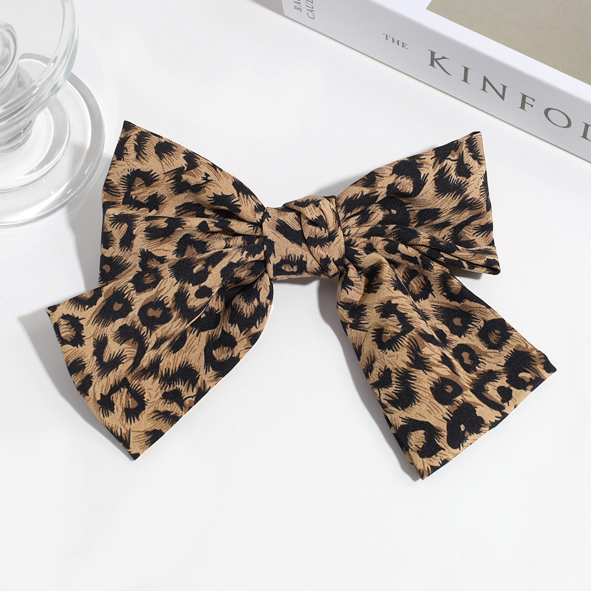 Estilo de moda europeo y americano personalidad nicho de diseño arco leopardo aro de pelo clip de resorte retrógrado anillo para el pelo accesorios para el pelo