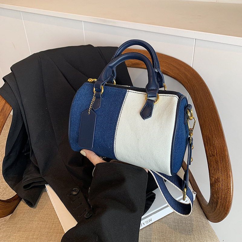 Bolso de Boston para mujeres de comercio exterior nuevo denim color contrastante empalme bolso de almohada de mano alta sensación de hombro mochila