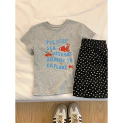 女性のための右肩ピュアコットン Tシャツ 2025 夏ルーズパーソナライズプリント半袖ラウンドネックニッチ韓国スタイルベーシックトップ