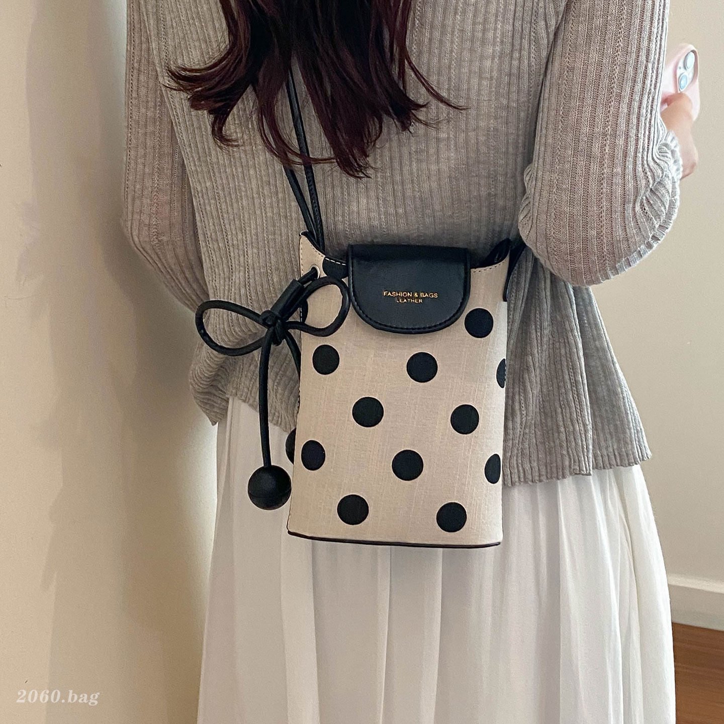 Un hombro de moda de viaje nuevo punto de onda bolso superfuego bolso de mochila para mujeres verano 2026 sensación coreana
