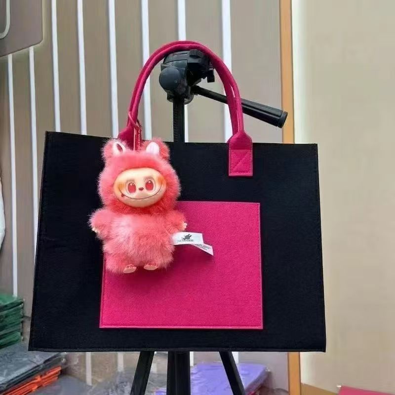 Nuevo colgante de mochila de tela Rabu pellizcar música pu rebote lento artefacto de descompresión juguete decoración de escritorio muñeca al por mayor