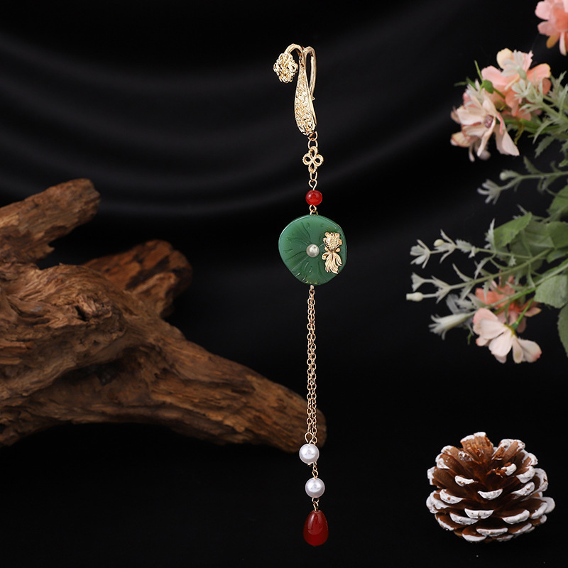 Nuevo estilo chino cheongsam colgante de tapeta de presión femenino de alta gama borla estilo chino Magnolia Ruyi Palace Hanfu Accesorios