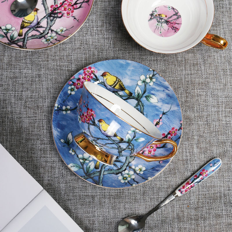 Flor y pájaro pintura oro hueso China taza de café platillo traje nuevo pequeño lujo Té taza de té