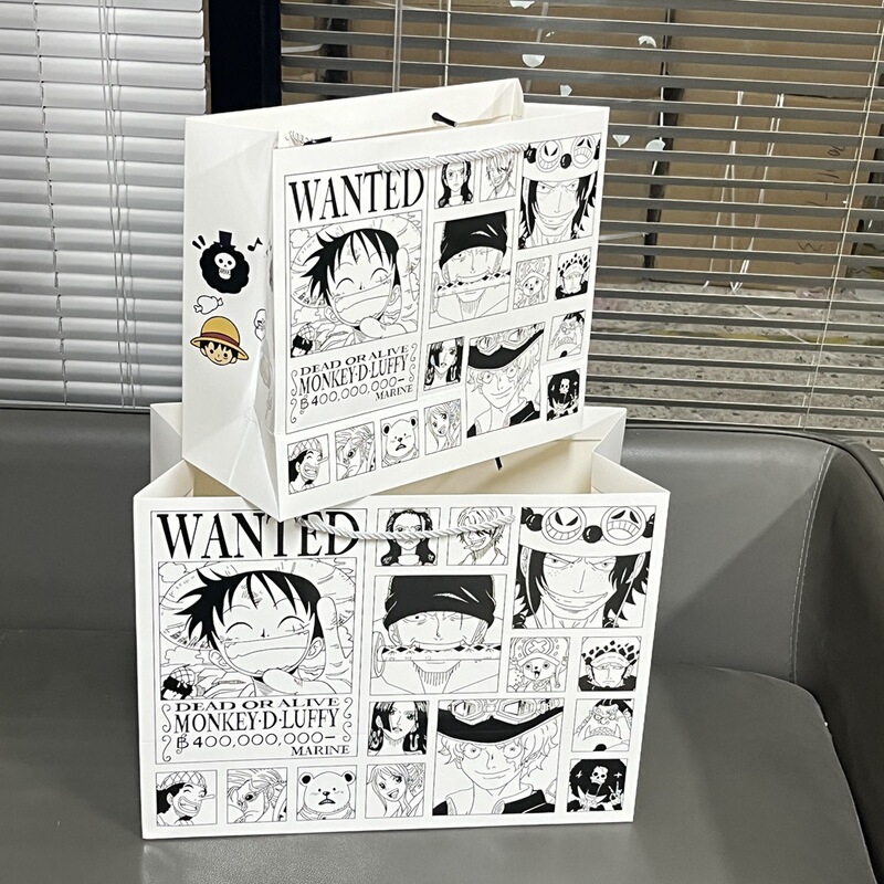 大きいサイズの白黒漫画の風の海賊の王の索隆路飛の贈り物の袋の誕生日の贈り物の包装の手提げのショッピングバッグの卸売り|undefined