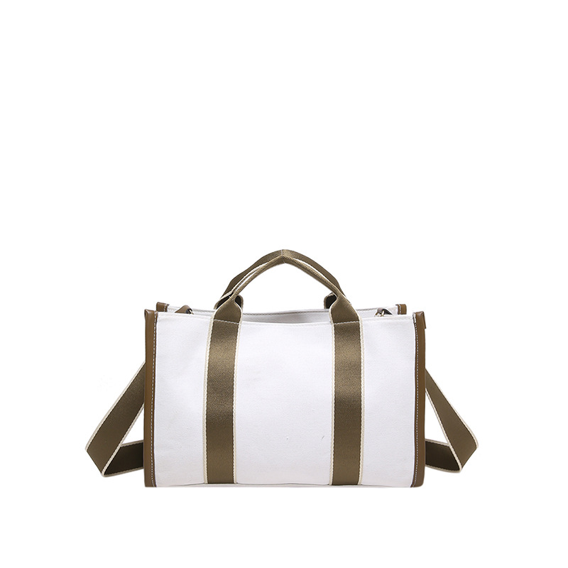 2024 invierno nuevo estilo de moda coreana ins bolso de lona de gran capacidad de viaje bolso de hombro bolso de colisión de color