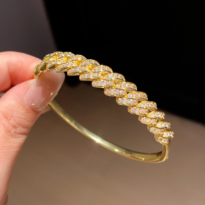 50 pulseras - doradas