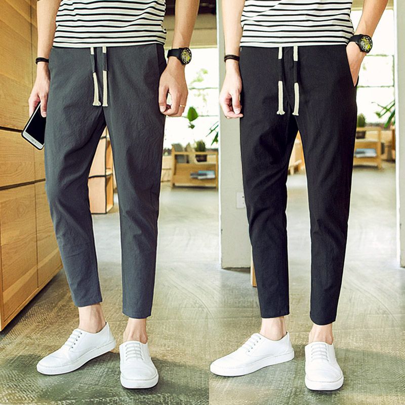 Pantalones cortos casuales pantalones de verano de 9 puntos para hombres, pies pequeños, pantalones de lino rectos coreanos sueltos, pantalones harem para estudiantes de secundaria para hombres