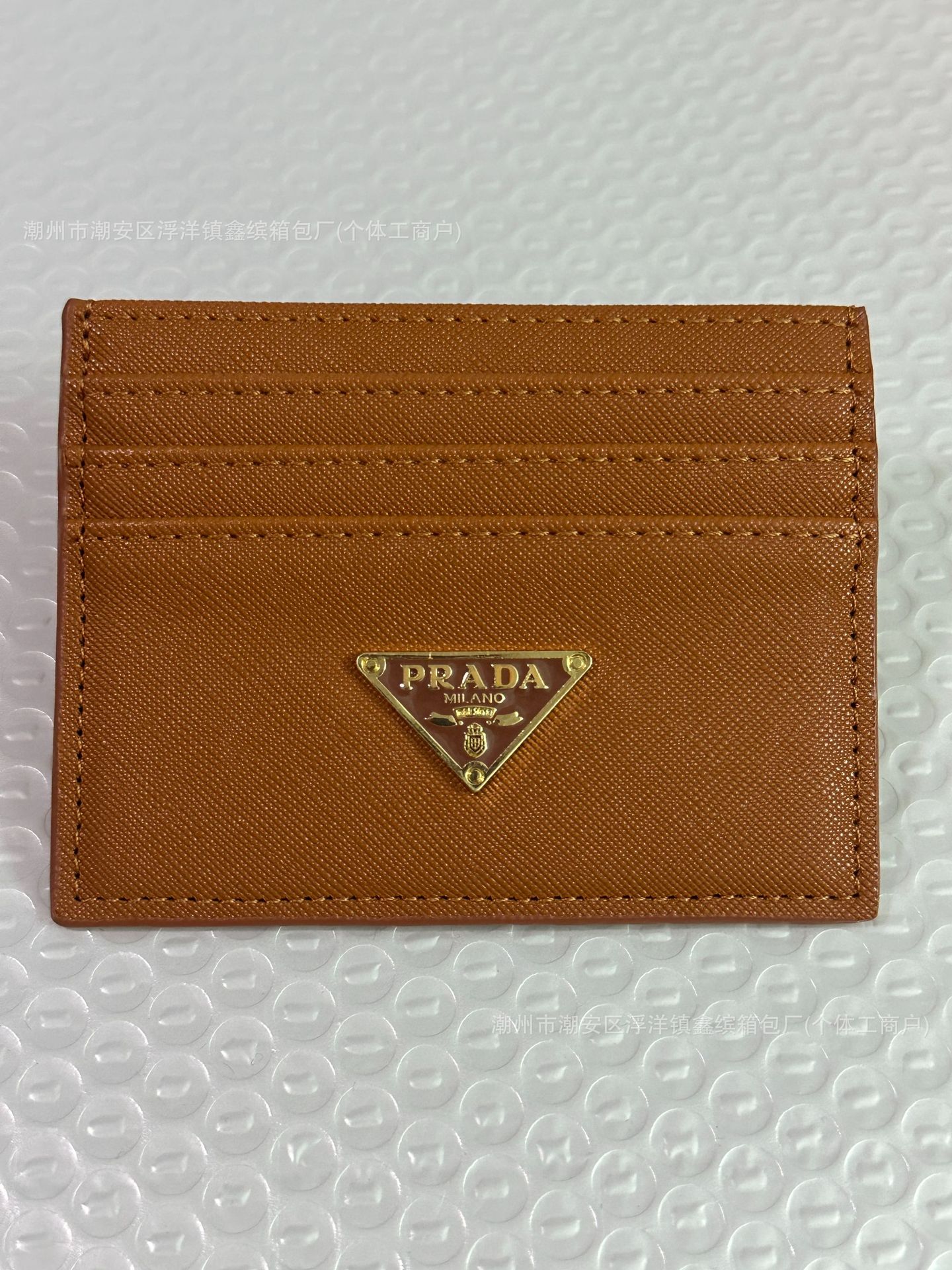 Paquete de tarjetas Juego de tarjetas 7 modelos de tarjeta P fabricante spot al por mayor marca de moda patrón de cruz estándar triangular gran marca cuero suave alto