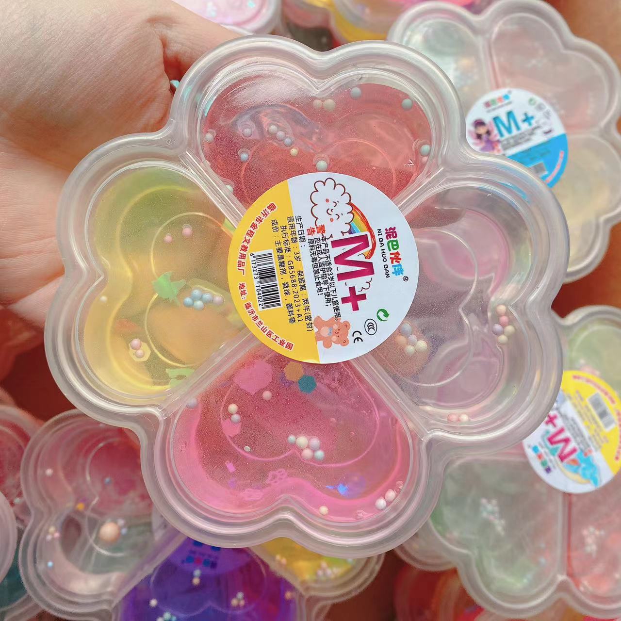 Barro de cristal de cuatro hojas de barro de cristal de ciencia y educación goma espumante slime 4 colores para niños diy alta transparencia 4 cuadros 2 yuanes lotes de departamentos