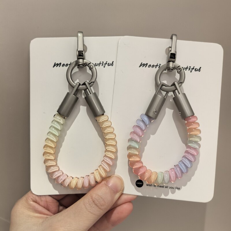 Colorful telephone cord keychain, mobile phone lanyard, fashionable accessory, bag accessory, anti-loss cord, cute small pendant decoration Colorful telephone cord keychain, mobile phone lanyard, fashionable accessory, bag accessory, anti-loss cord, cute small pendant decoration