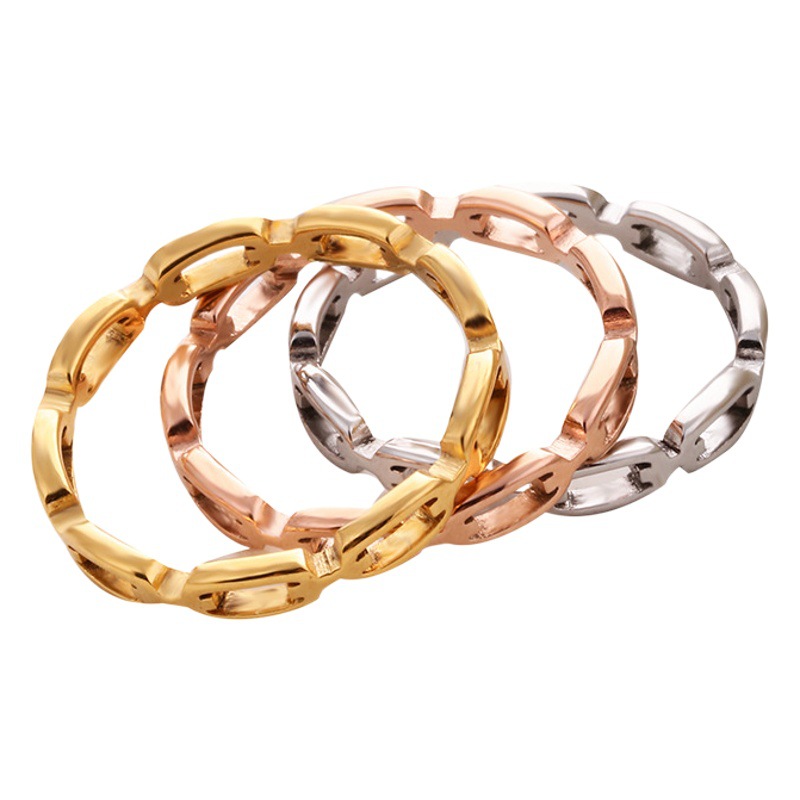 Anillo de pareja de acero inoxidable transfronterizo personalidad de la moda diseño de cadena hueca joyas de acero de titanio de oro rosa para mujeres