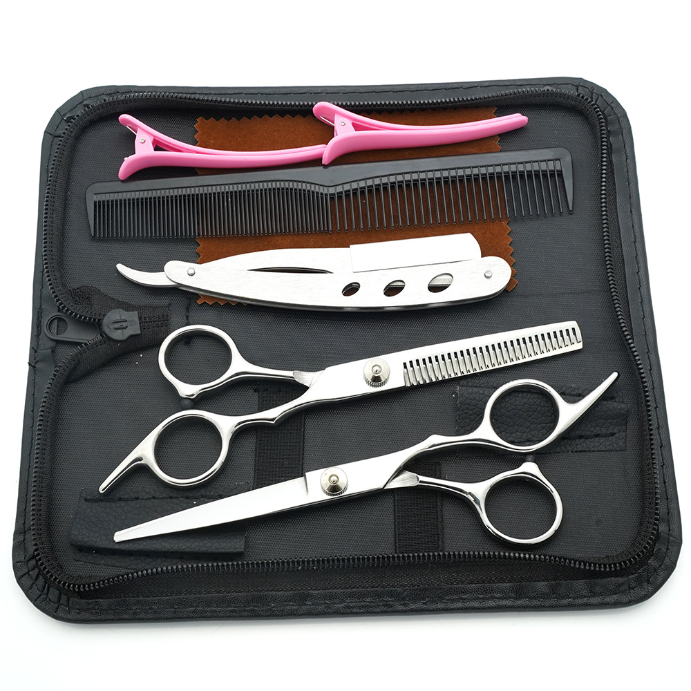 Tijeras de peluquería de 6 pulgadas, negras y doradas, con mango inclinado y de alta calidad, juego de tijeras de peluquería al por mayor para cortar el cabello.