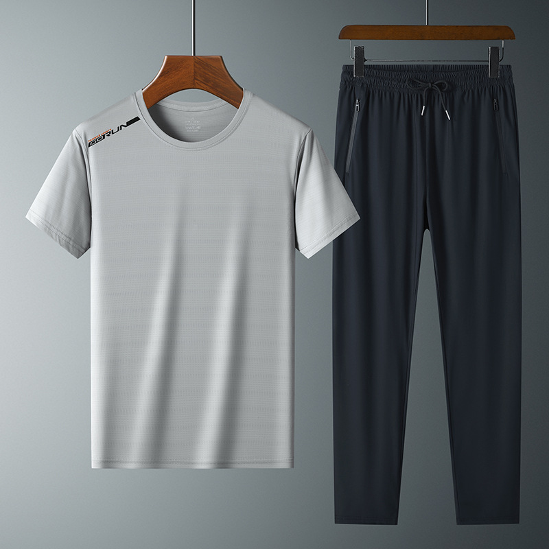Moda pantalones de seda de hielo cuello redondo Camiseta de dos piezas para hombres talla grande suelta de secado rápido traje deportivo LOGO se puede formular