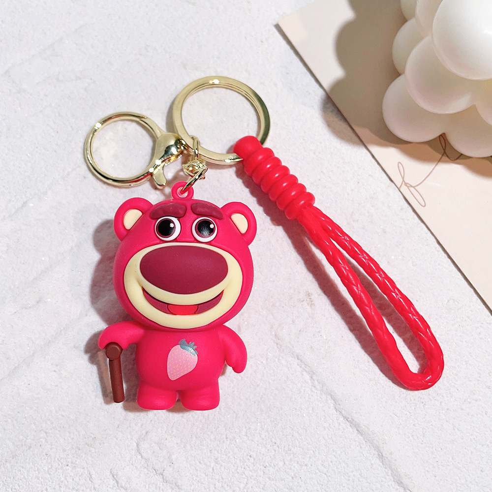 Llavero de silicona de Toy Story, el popular dibujo animado, con personajes como el alienígena de tres ojos, Buzz Lightyear y el oso Lotso, ideal como adorno para bolso.