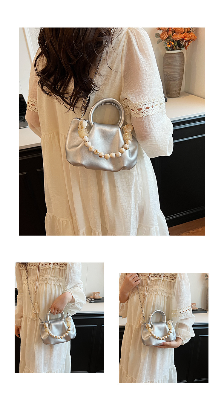 High end handbag for women in 2024, new niche design, summer handheld pleated chain strap, crossbody cloud bag_voghion.com