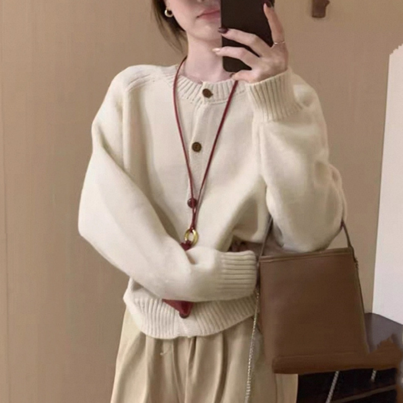 Corea del Sur 2025 otoño y invierno nuevo estilo extranjero V-cuello grueso aguja floja de color sólido jersey de punto suéter