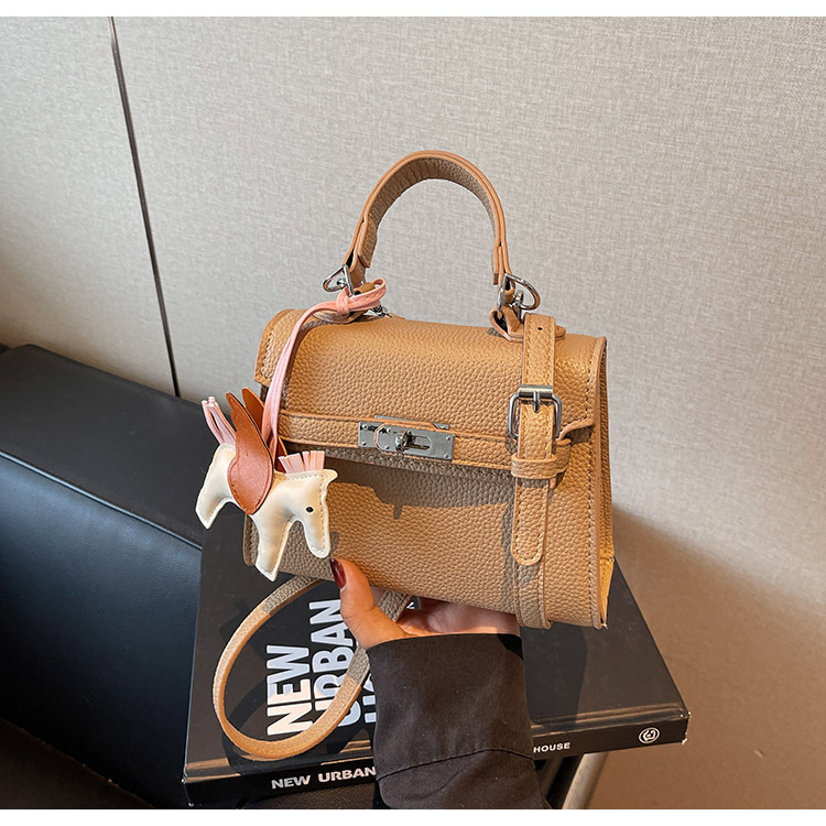 The Korean version of the hand-held small square bag for women in 2025, a new single-shoulder bag with a niche design, simple and versatile, trendy crossbody Kelly bag undefined