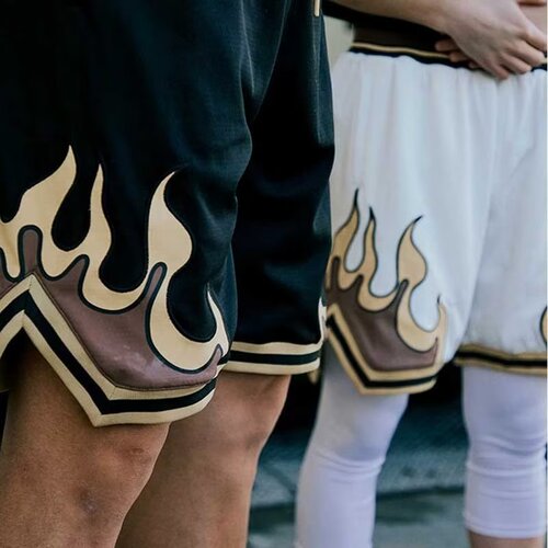 American-style basketball shorts with flame-inspired collaboration—men's knee-length, high-street fitness & casual wear, featuring a breathable, trendy design.