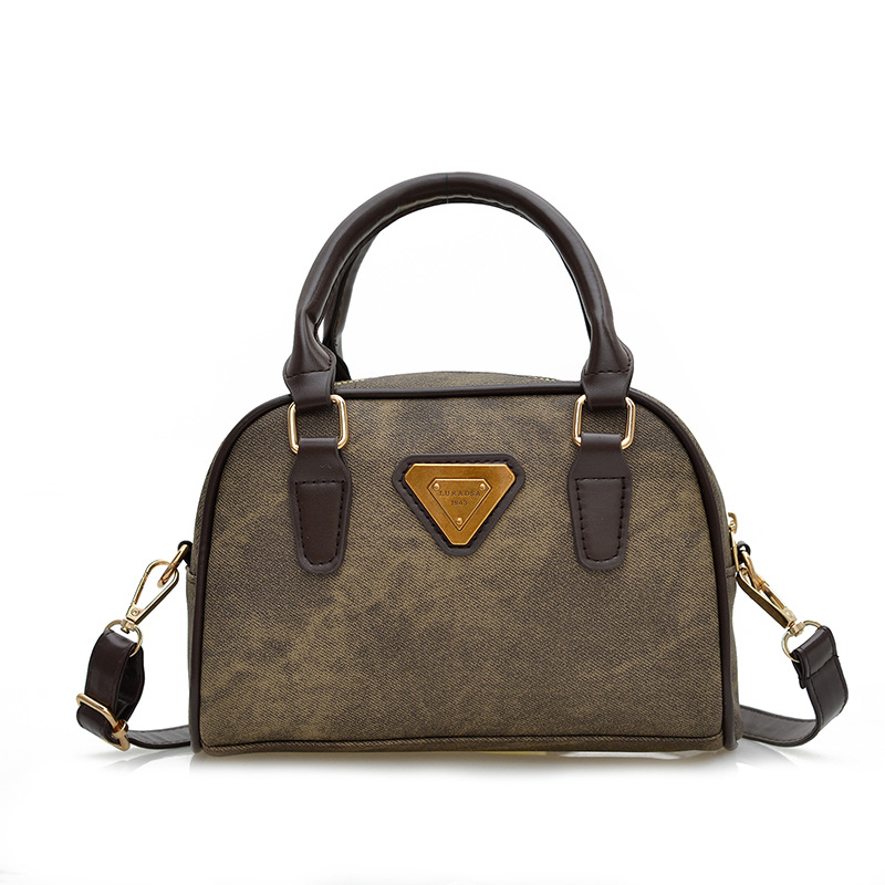 Color retro bolso mujer 2025 primavera y verano nuevo bolso de almohada de mano textura de moda personalidad mochila de viaje