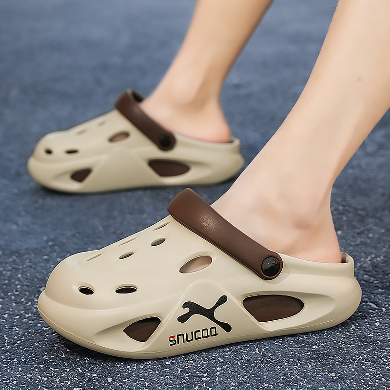 Verano al aire libre suela gruesa antideslizante pisando mierda zapatos con agujeros comercio exterior para hombres moda de gran tamaño playa de doble uso sandalias y zapatillas Baotou