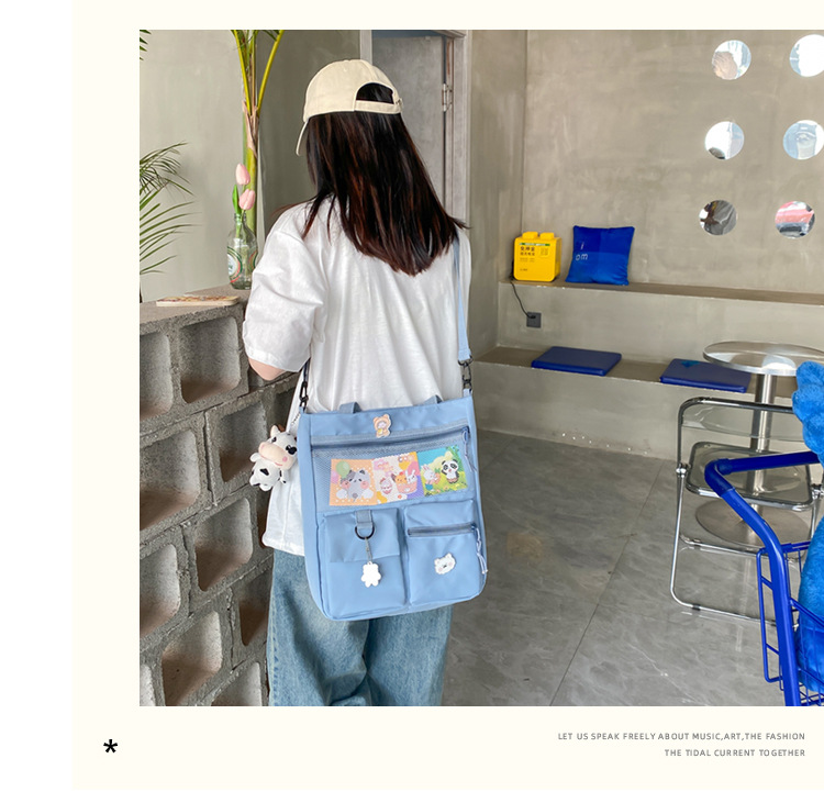 Large-capacity Japanese-style single-shoulder canvas bag for girls, versatile crossbody, ins, a tote bag for junior high school students' classes, and a schoolbag for after-school tutoring undefined