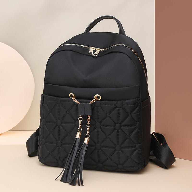 Mochila de bordar Lingge para mujer 2024 nueva versión coreana de la mochila de viaje salvaje mochila de viaje de gran capacidad para estudiantes de viaje