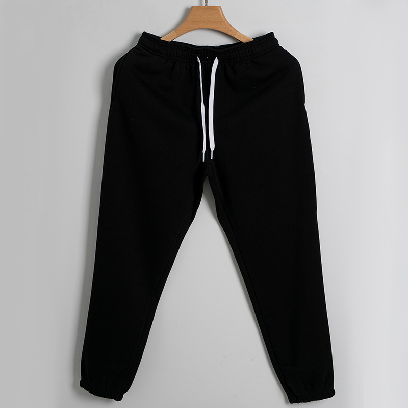 De gama alta de 430g de lana forrada engrosada Pantalones deportivos de otoño e invierno de los hombres Nuevos pantalones sueltos de algodón atado al tobillo pantalones casuales de chándal de las mujeres