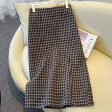 咖色羊绒a字半身裙女秋冬季2025新款巨好看包臀裙羊毛呢直筒裙子