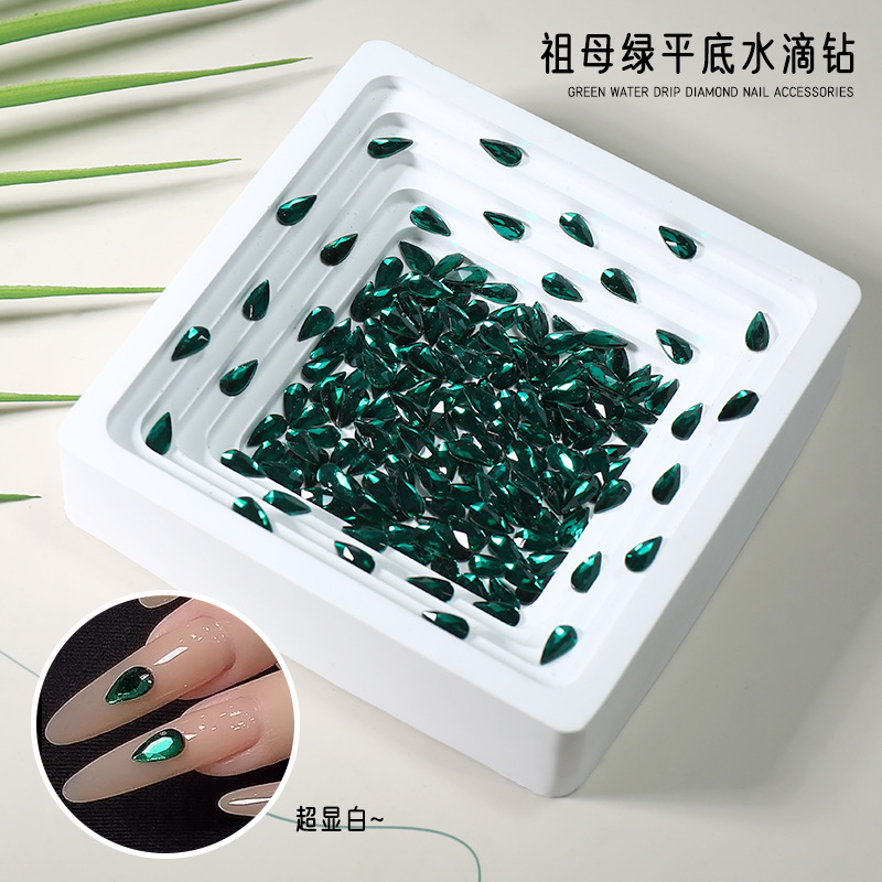 Manicure nuevo esmeralda gota de agua de fondo plano manicure perforación de gota de agua larga perforación de red de color rojo blanqueador decoración de uñas