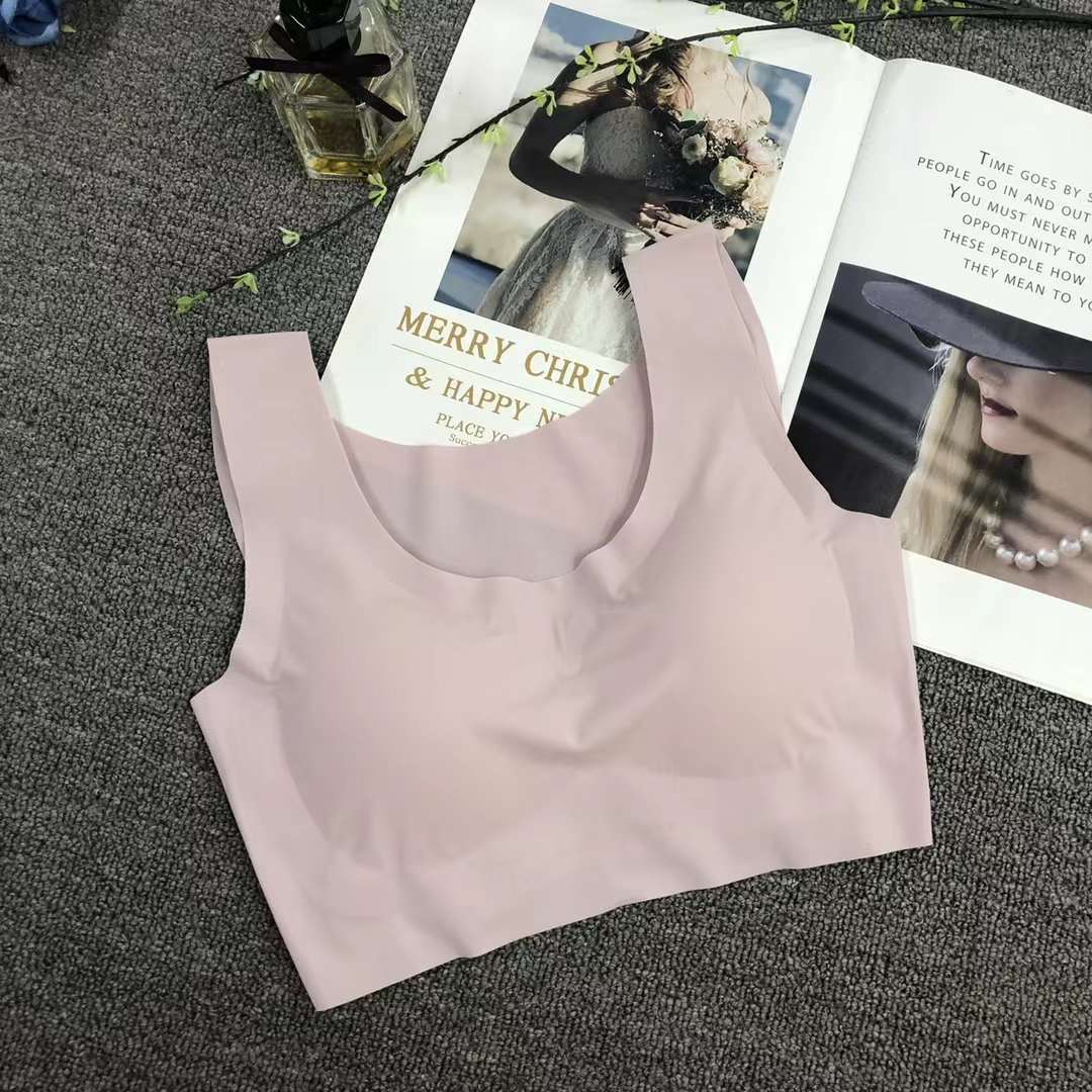 Nueva ropa interior deportiva de color sólido de las mujeres pequeño pecho push up pecho grande pequeño sujetador inalámbrico adhesivo sin costuras Sujetador deportivo